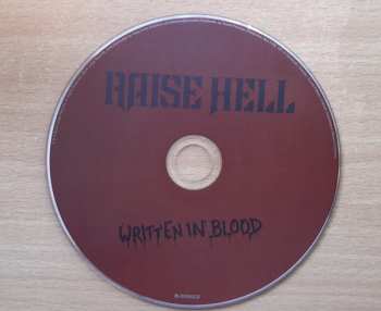 CD Raise Hell: Written In Blood 40972